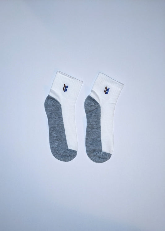 White and gray socks with double chevron accent