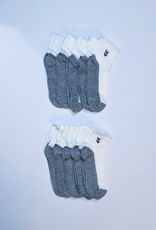 White and gray socks with double chevron accent